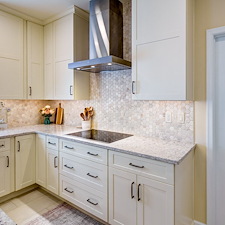 Warm-Creamy-White-Painted-Cabinetry-Paired-Organic-Wood-Grained-Timber-Kitchen-Remodel-in-East-York 4